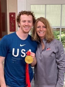 Noah Grove and his mother with his 2022 gold medal